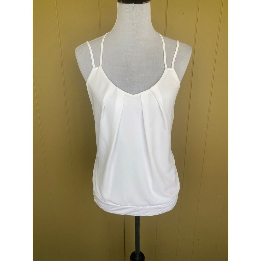 Express women S low cut tank top w/spaghetti straps and racerback floral back wh